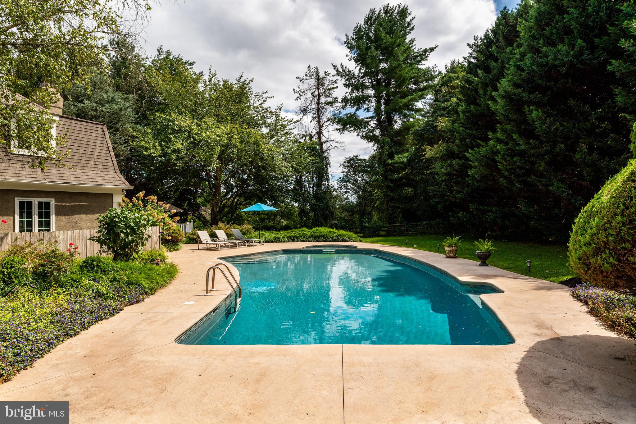 1429 Flat Rock Road Penn Valley, PA 19072 - Photo 52 of 58 a view of a swimming pool with an outdoor space