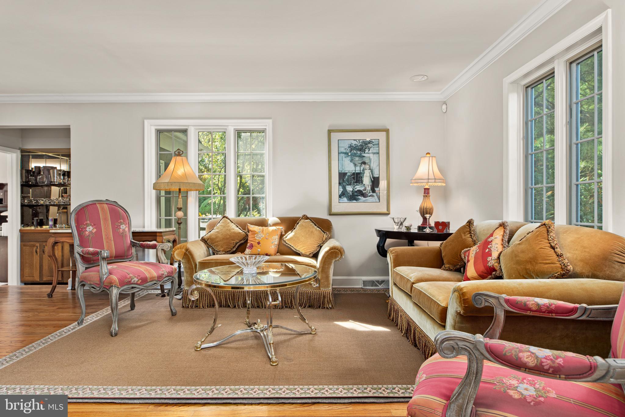 1429 Flat Rock Road Penn Valley, PA 19072 - Photo 10 of 58 a living room with furniture a rug and a large window