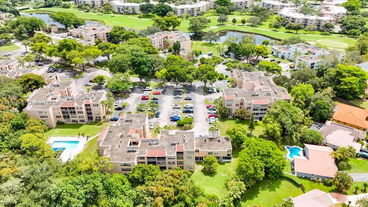 9450 Live Oak Place, Unit 109 Davie, FL 33324 - Photo 78 of 98 an aerial view of residential houses with outdoor space and trees all around