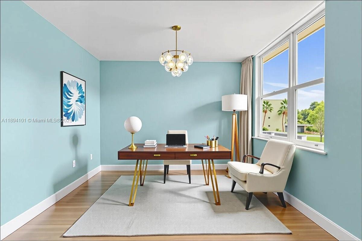 9450 Live Oak Place, Unit 109 Davie, FL 33324 - Photo 92 of 98 a workspace with furniture window and wooden floor