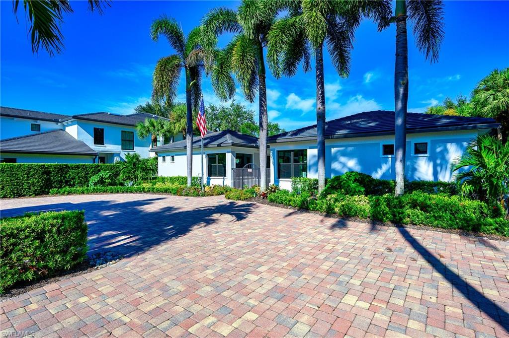 2371 Ravenna Boulevard, Unit 101 Naples, FL 34109 - Photo 27 of 44 View of front of home