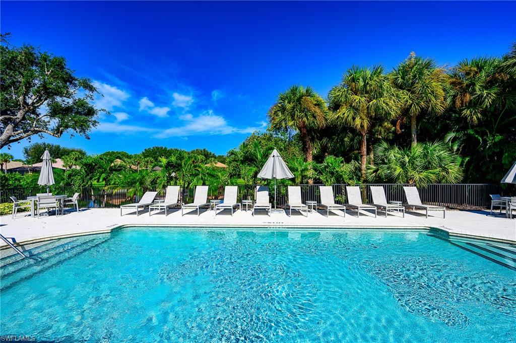 2371 Ravenna Boulevard, Unit 101 Naples, FL 34109 - Photo 28 of 44 View of pool featuring a patio