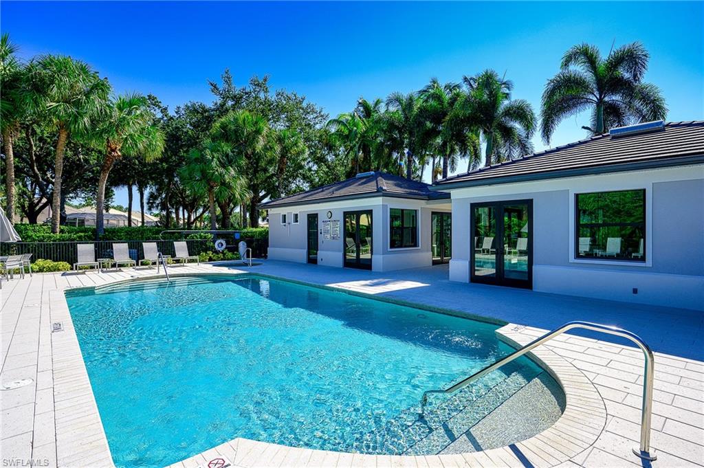2371 Ravenna Boulevard, Unit 101 Naples, FL 34109 - Photo 32 of 44 View of swimming pool featuring a patio and french doors