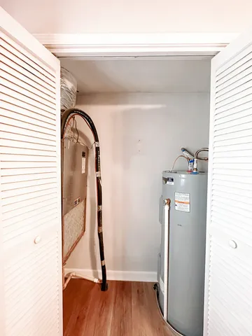 a room with a door and wooden floor