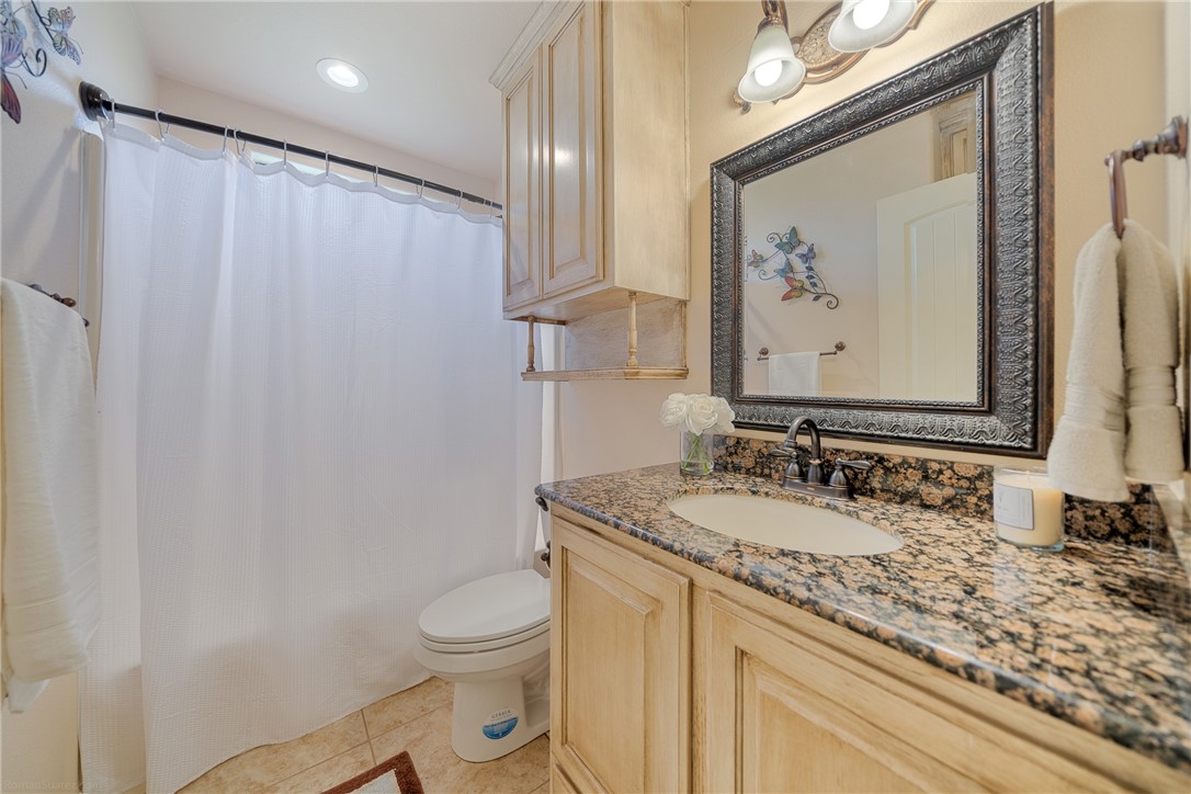 5889 Hidden Valley Loop Sandia, TX 78383 - Photo 19 of 36 Guest Bathroom In Hallway Situated Between Two Bed