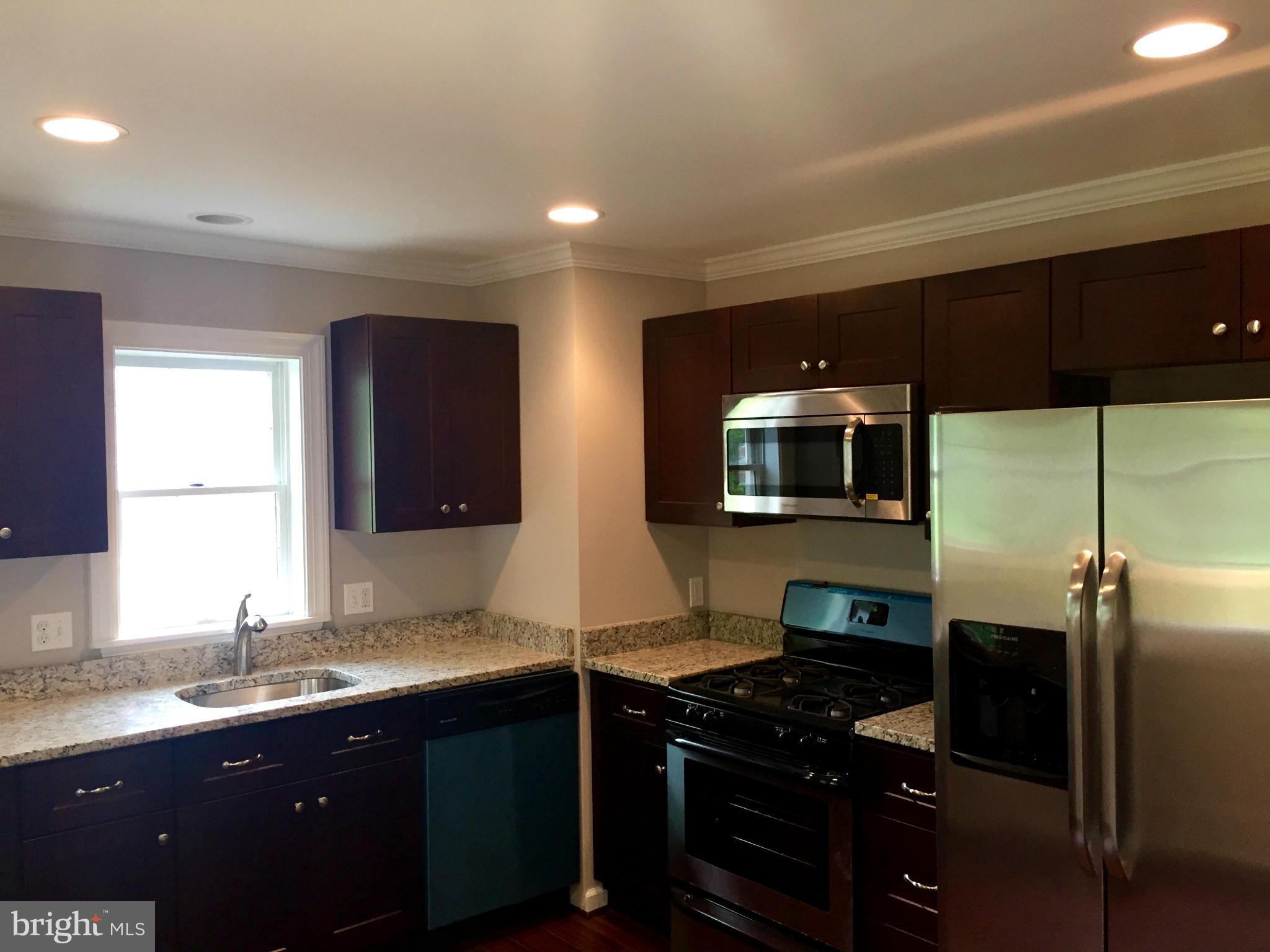 1610 Yakona Road Baltimore, MD 21286 - Photo 10 of 27 New Kitchen with Granite Countertops