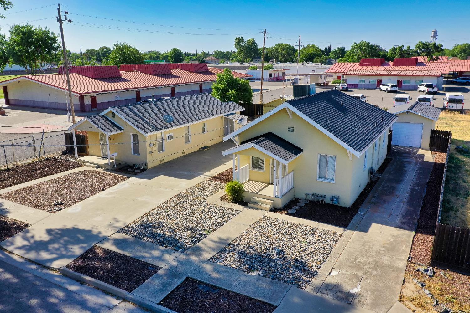 a aerial view of a house with a yard