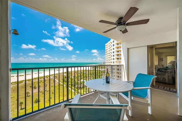 a workspace with furniture and a chandelier