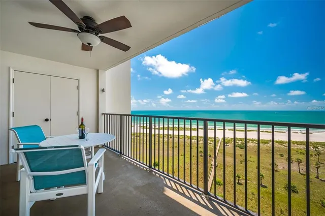 a view of a swimming pool and trees in the background