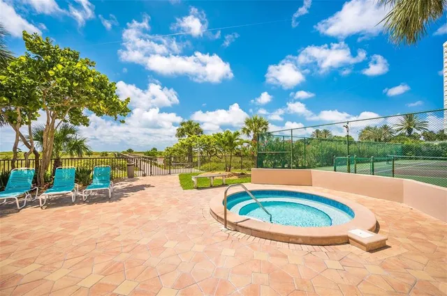 a view of a backyard with a patio