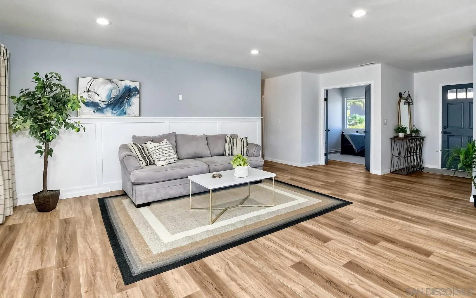 13360 Floral Avenue Poway, CA 92064 - Photo 12 of 37 a living room with furniture and a wooden floor