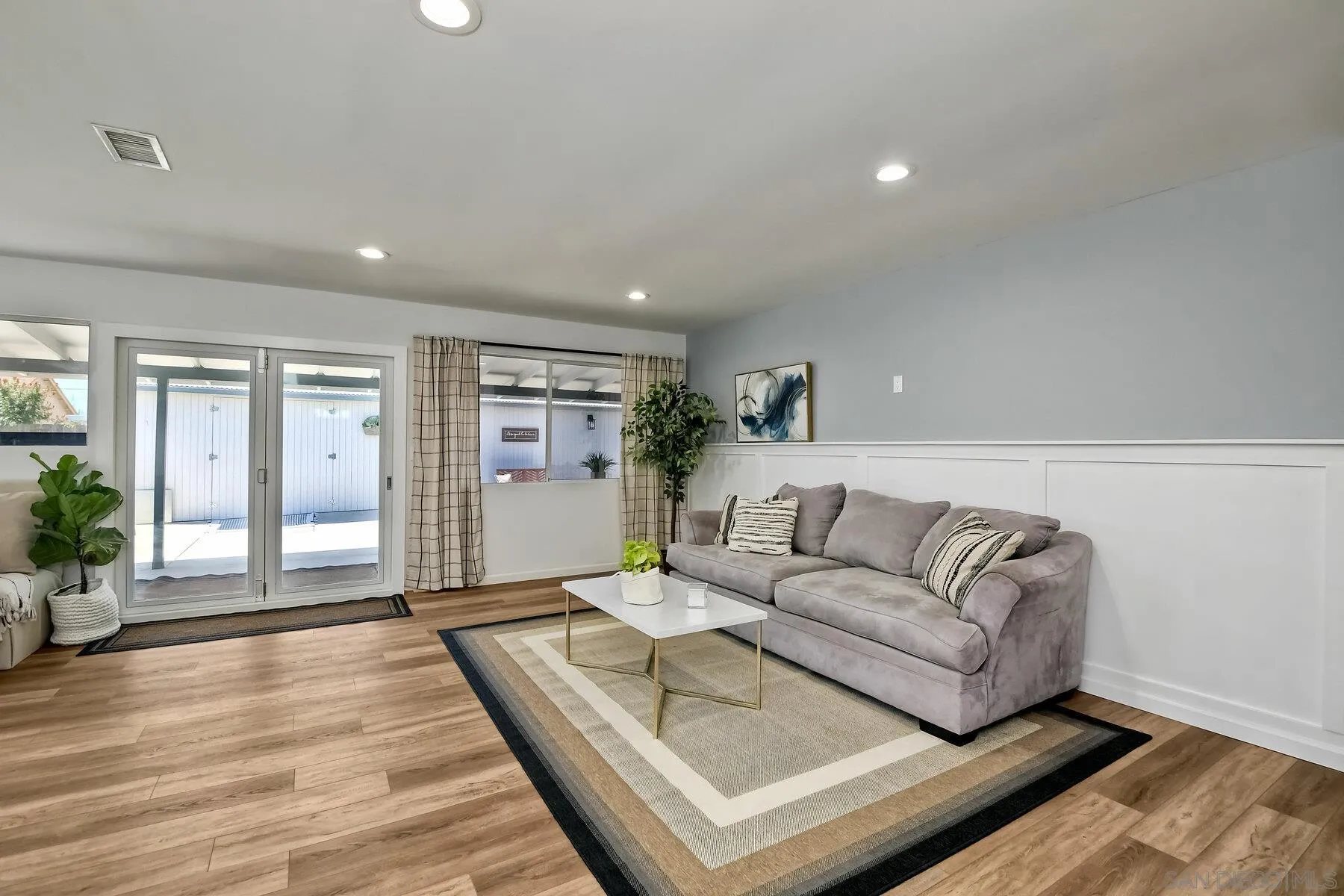 13360 Floral Avenue Poway, CA 92064 - Photo 13 of 37 a living room with furniture and wooden floor