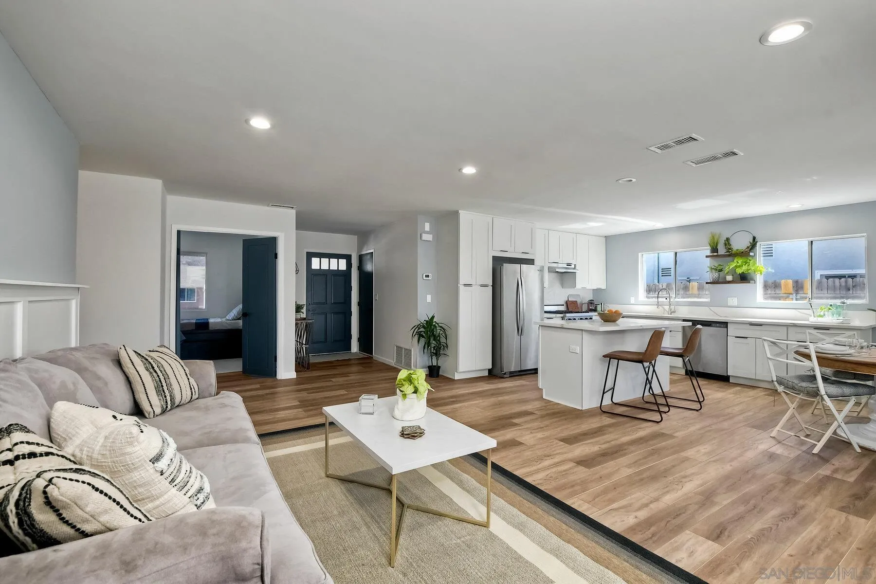 13360 Floral Avenue Poway, CA 92064 - Photo 15 of 37 a living room with furniture and kitchen view