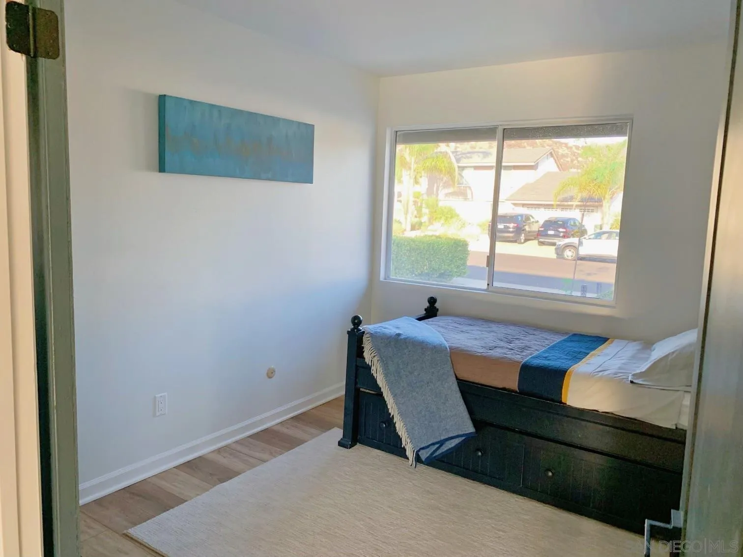 13360 Floral Avenue Poway, CA 92064 - Photo 16 of 37 a room that has a bed and a window
