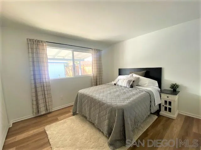 13360 Floral Avenue Poway, CA 92064 - Photo 18 of 37 a bed sitting in a bedroom next to a window