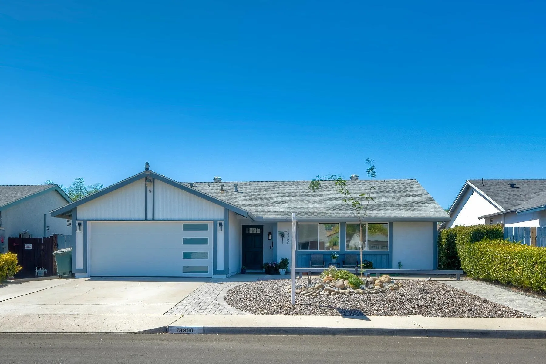 13360 Floral Avenue Poway, CA 92064 - Photo 3 of 37 a front view of a house with a yard