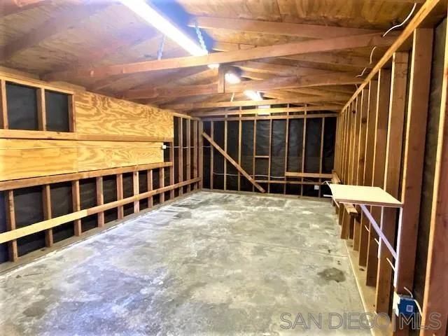 13360 Floral Avenue Poway, CA 92064 - Photo 33 of 37 a view of an empty room with wooden walls