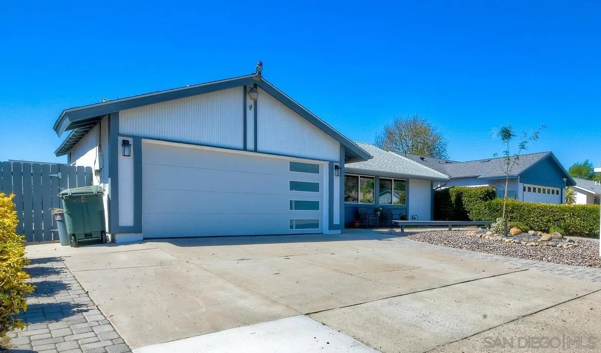 13360 Floral Avenue Poway, CA 92064 - Photo 37 of 37 a front view of a house with a garage
