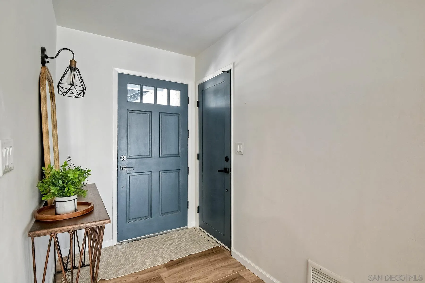 13360 Floral Avenue Poway, CA 92064 - Photo 4 of 37 a view of entryway with wooden floor