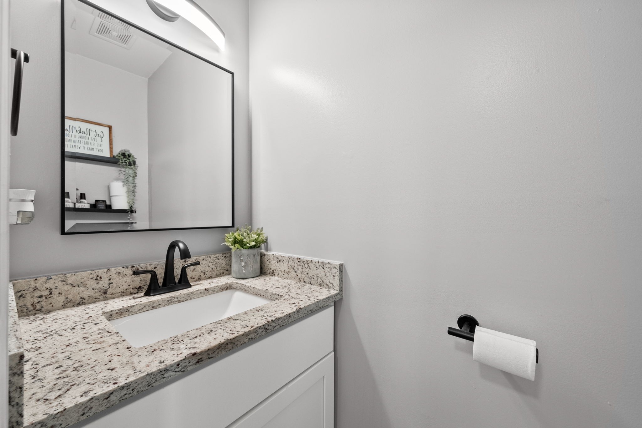 504 Eysian Road Clarksville, TN 37040 - Photo 19 of 41 a bathroom with a granite countertop sink and a mirror