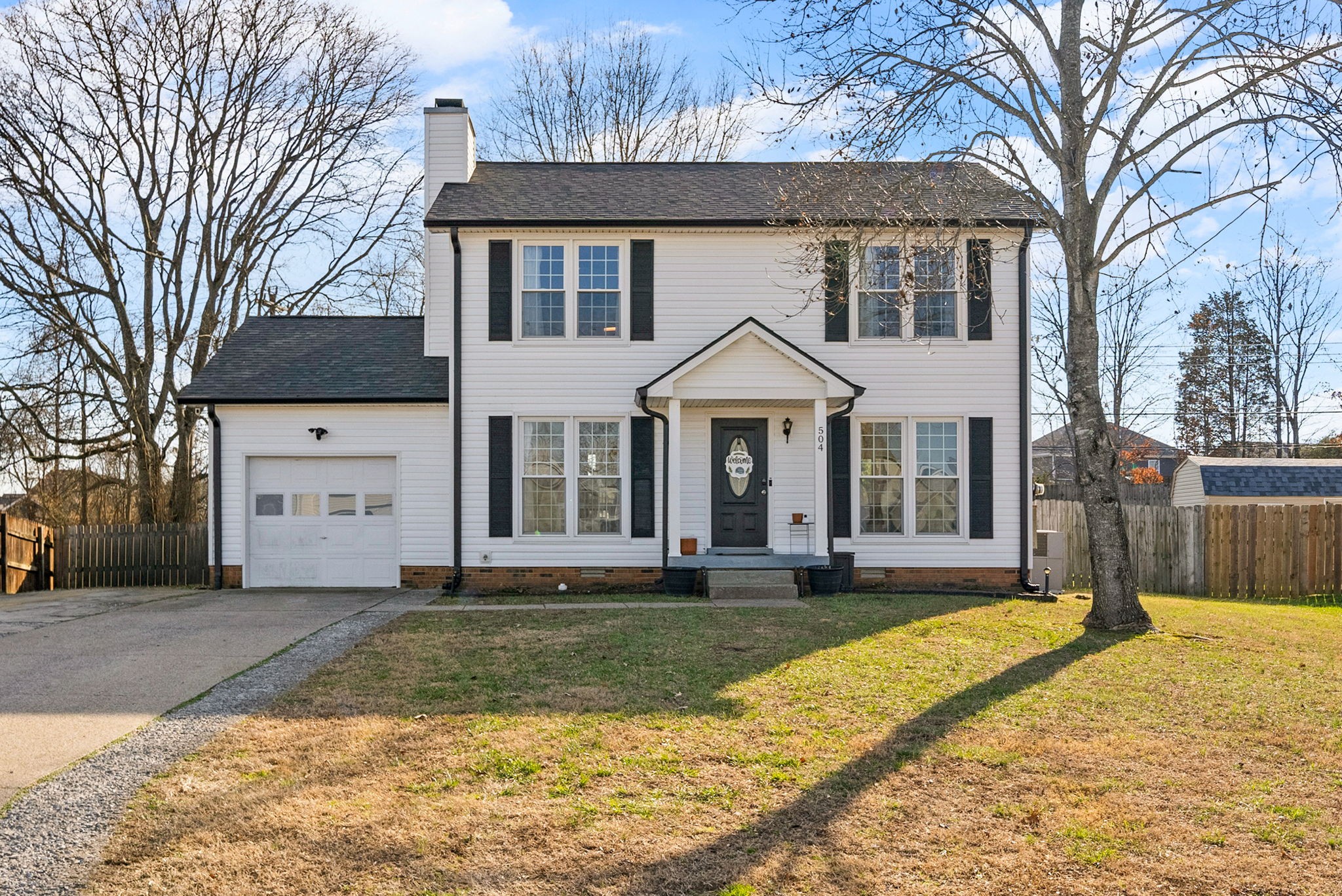 504 Eysian Road Clarksville, TN 37040 - Photo 2 of 41 a front view of a house with a yard