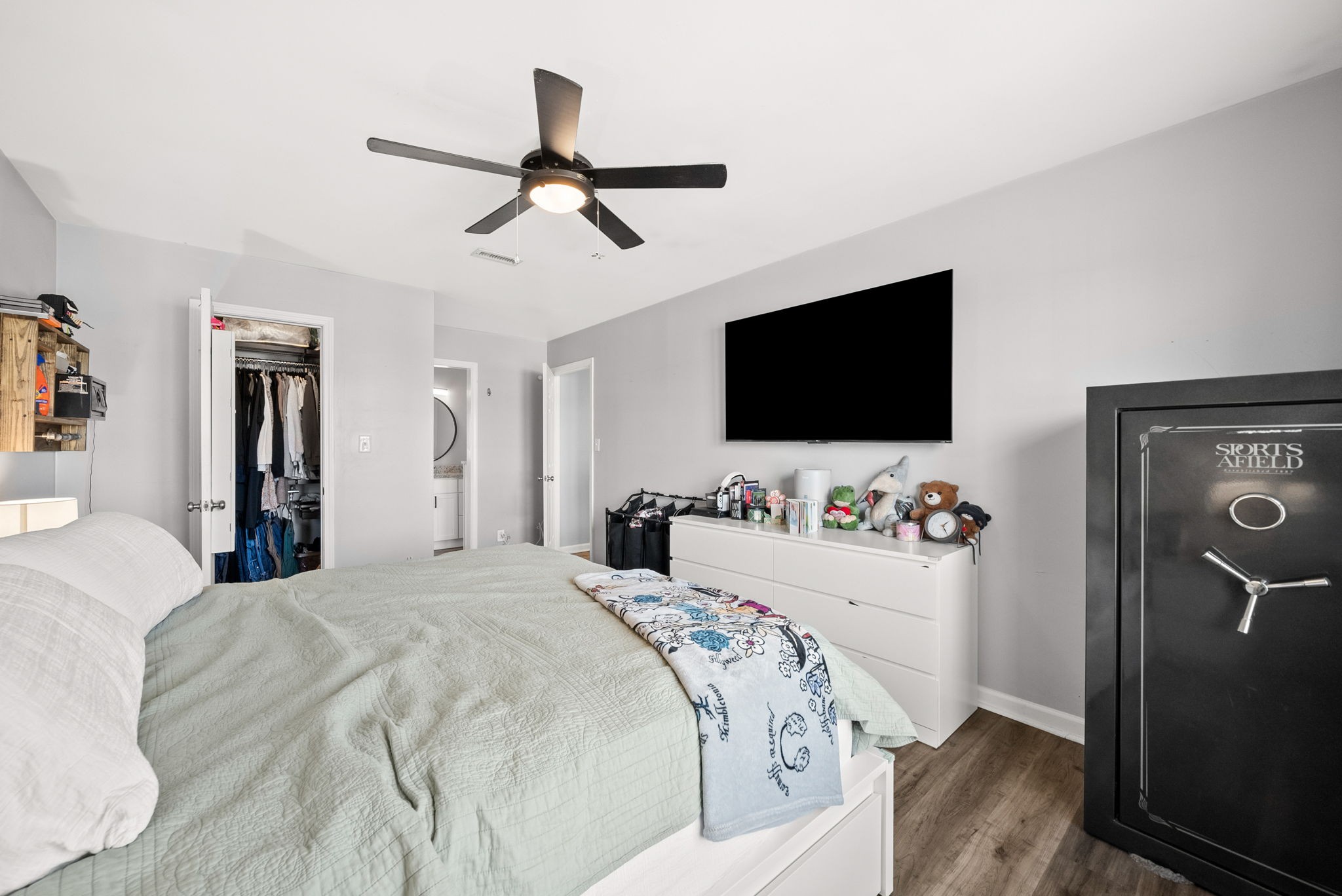 504 Eysian Road Clarksville, TN 37040 - Photo 22 of 41 a bedroom with a bed and a flat screen tv