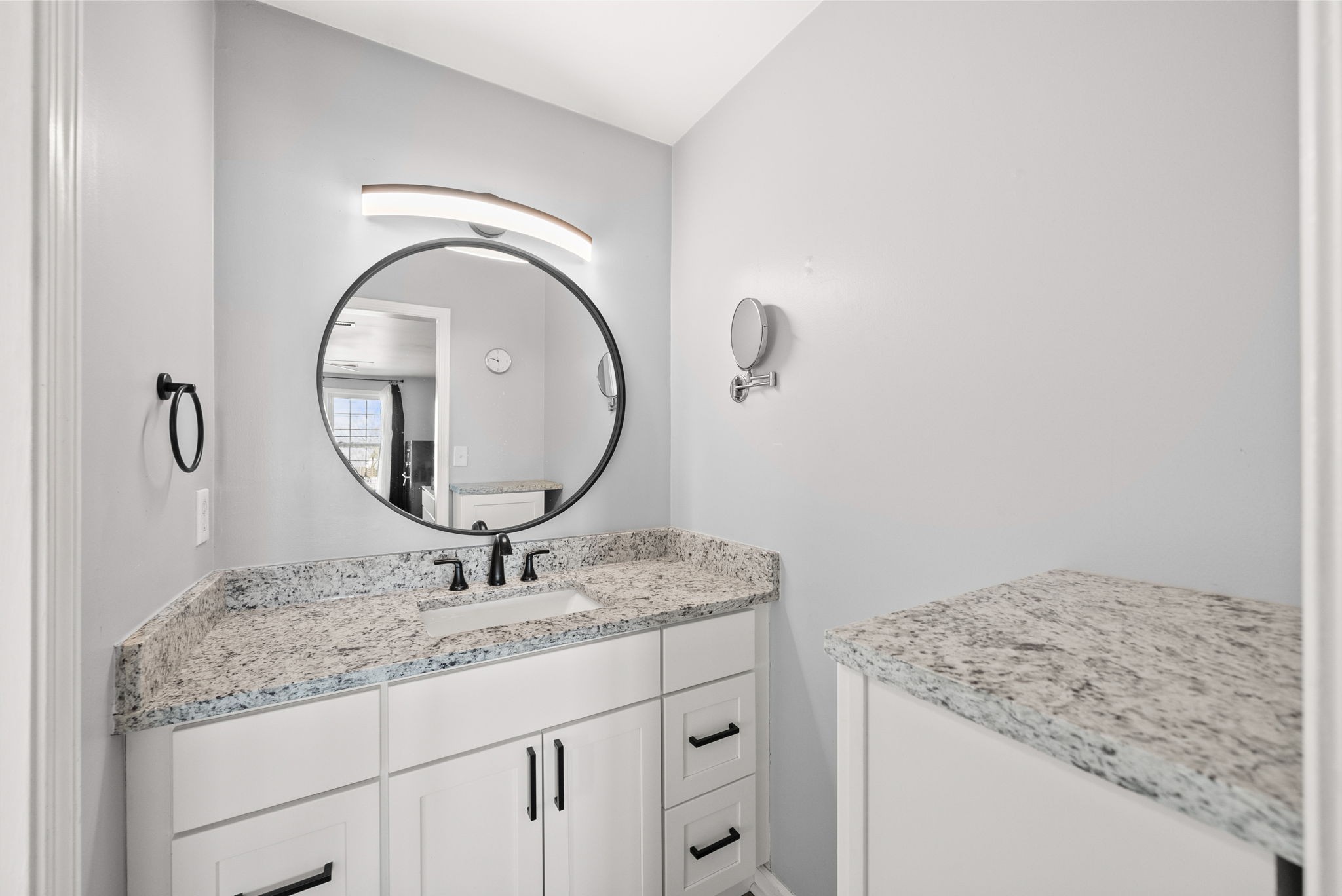 504 Eysian Road Clarksville, TN 37040 - Photo 23 of 41 a bathroom with a granite countertop sink a mirror and shower