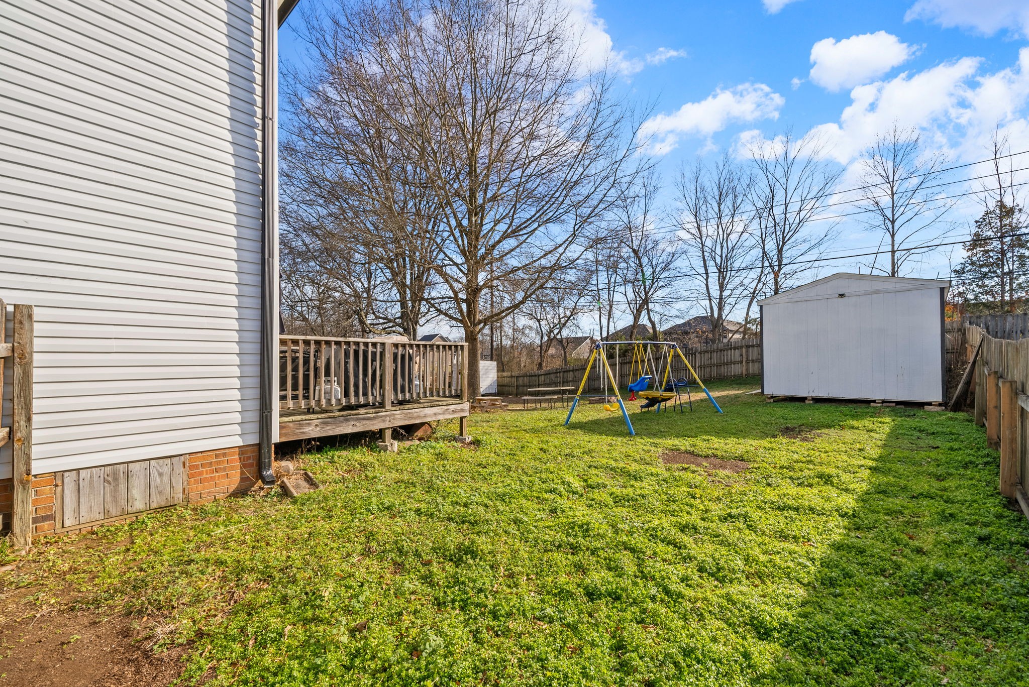 504 Eysian Road Clarksville, TN 37040 - Photo 34 of 41 a backyard of a house with table and chairs