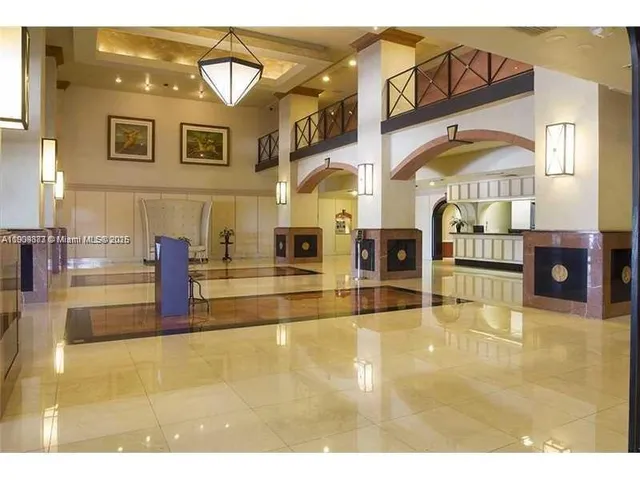 a view of a living room and bathroom