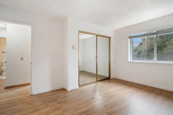 a kitchen with a stove and a microwave