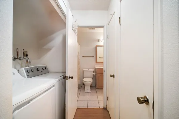 a bathroom with a sink and toilet