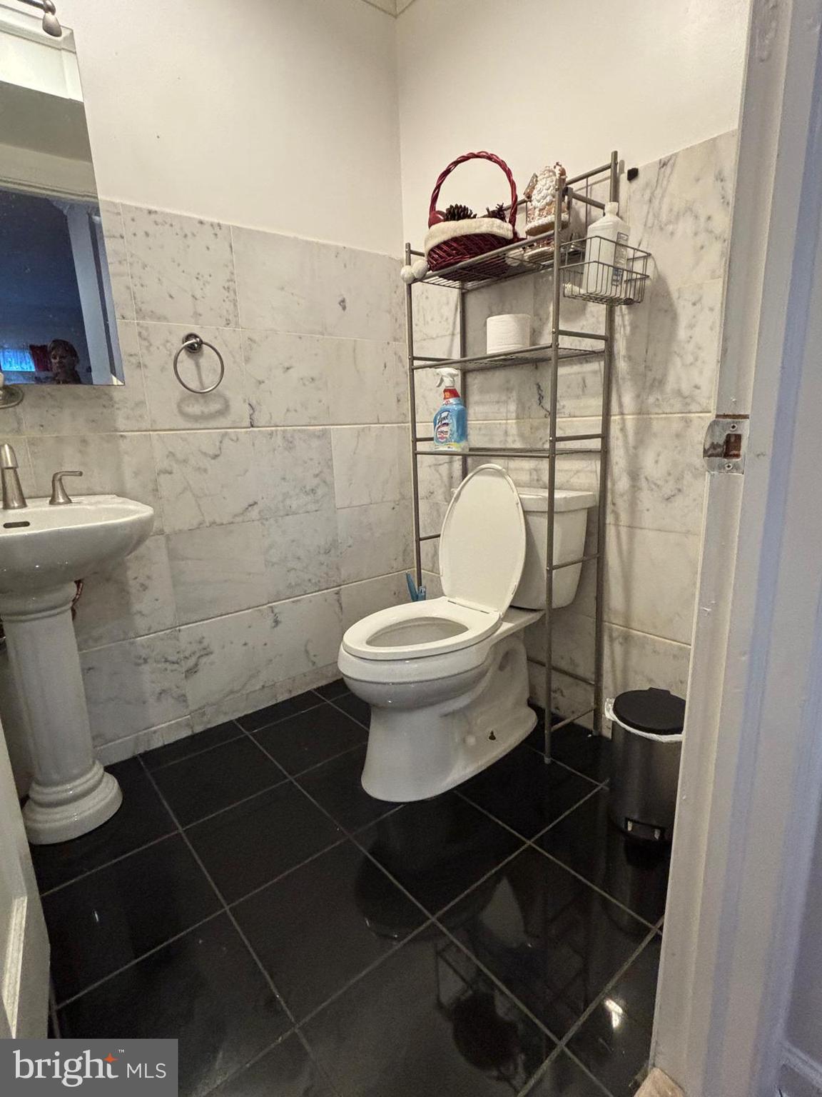 3610 64th Avenue Landover, MD 20785 - Photo 11 of 20 a bathroom with a toilet and a sink