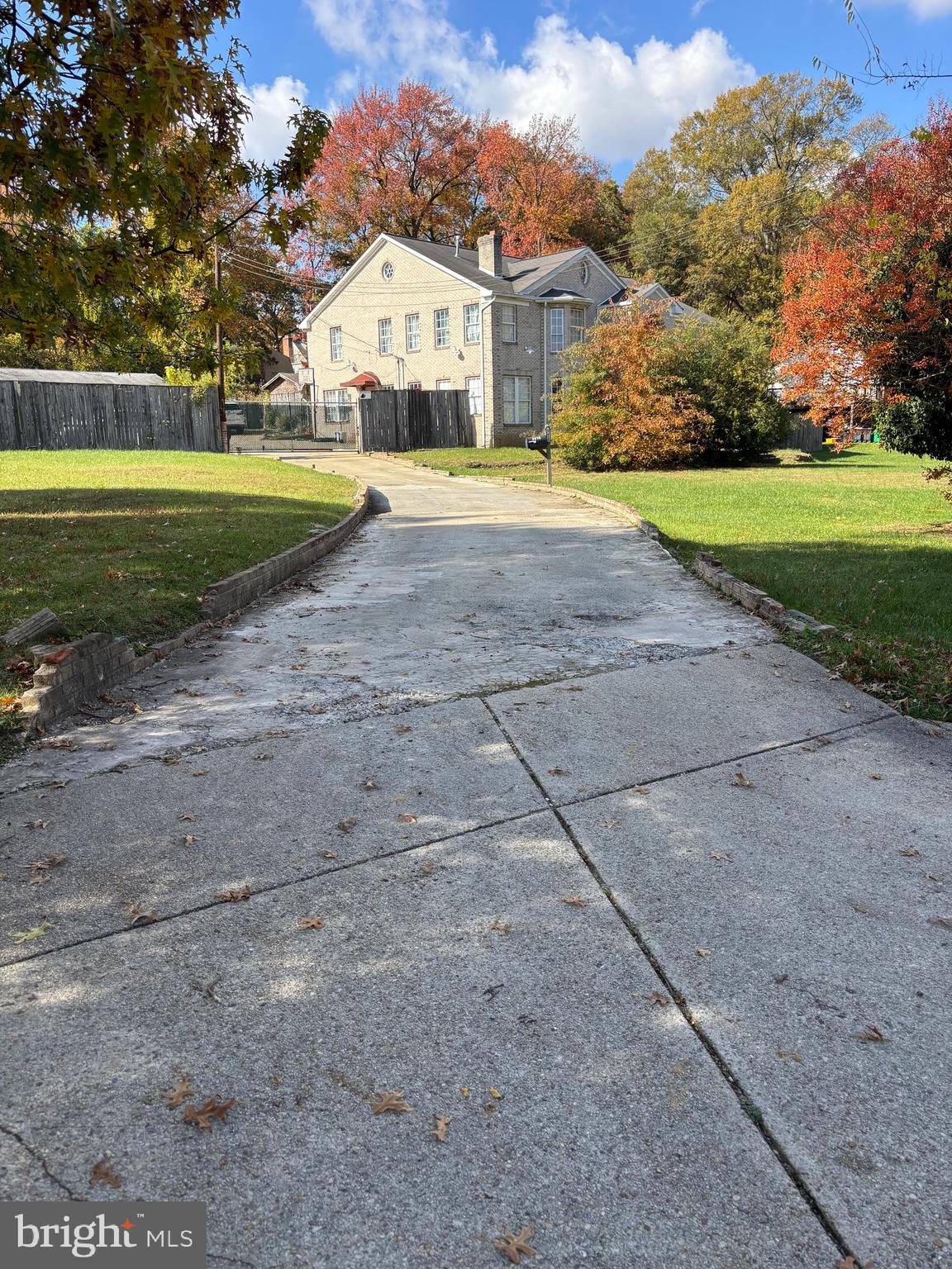 3610 64th Avenue Landover, MD 20785 - Photo 19 of 20 a view of a big house with a big yard and a large trees