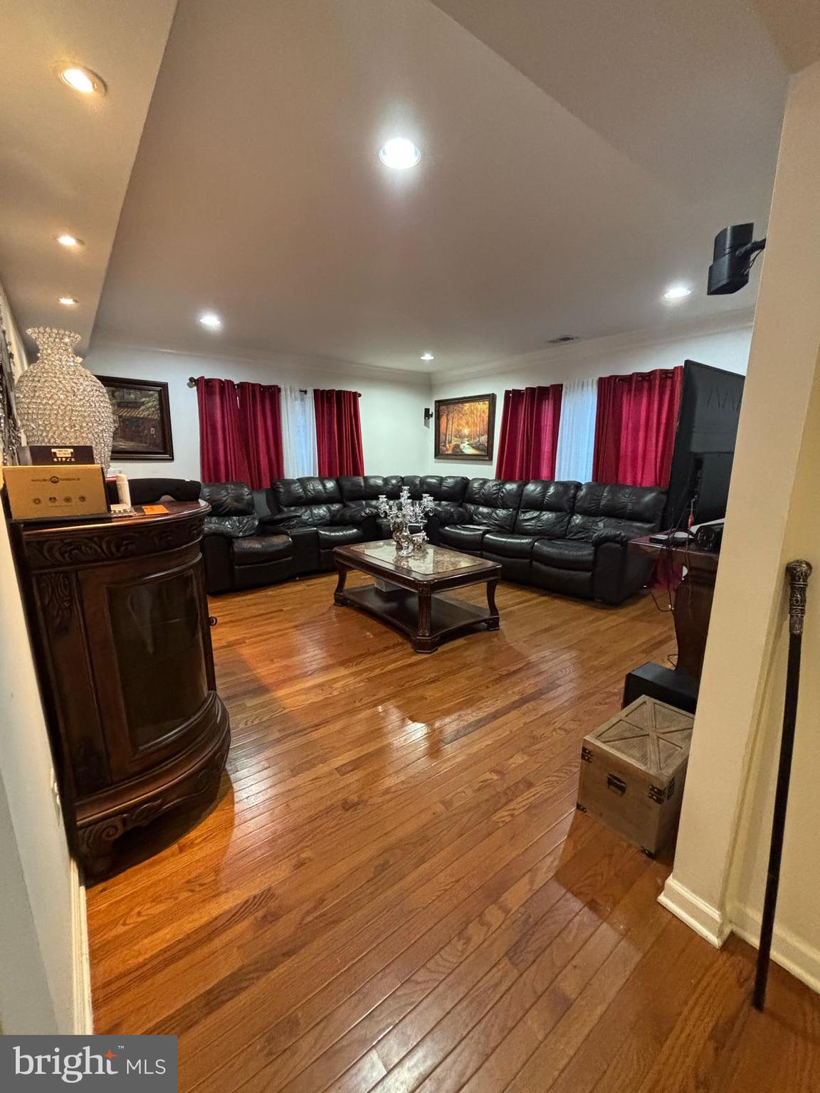 3610 64th Avenue Landover, MD 20785 - Photo 5 of 20 a living room with lots of furniture and a kitchen view