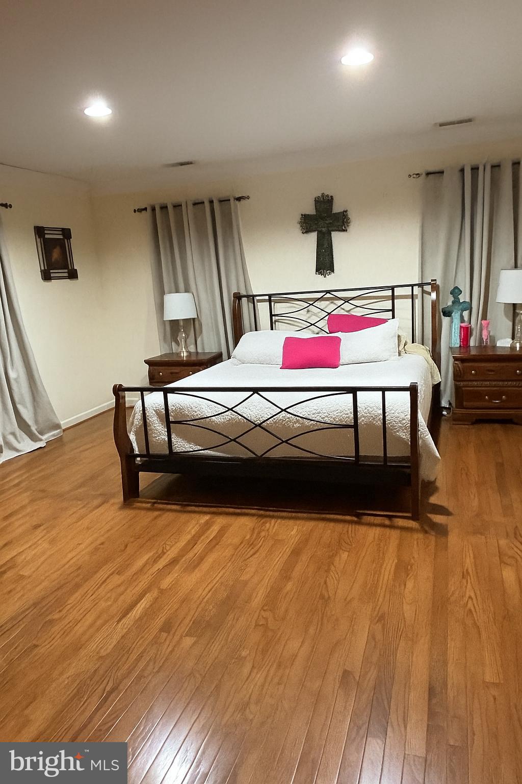 3610 64th Avenue Landover, MD 20785 - Photo 8 of 20 a bedroom with a bed and a wooden floor