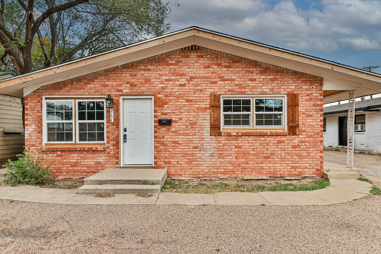 2104 22nd Street Lubbock, TX 79411 - Photo 4 of 33 Front Exterior Unit A