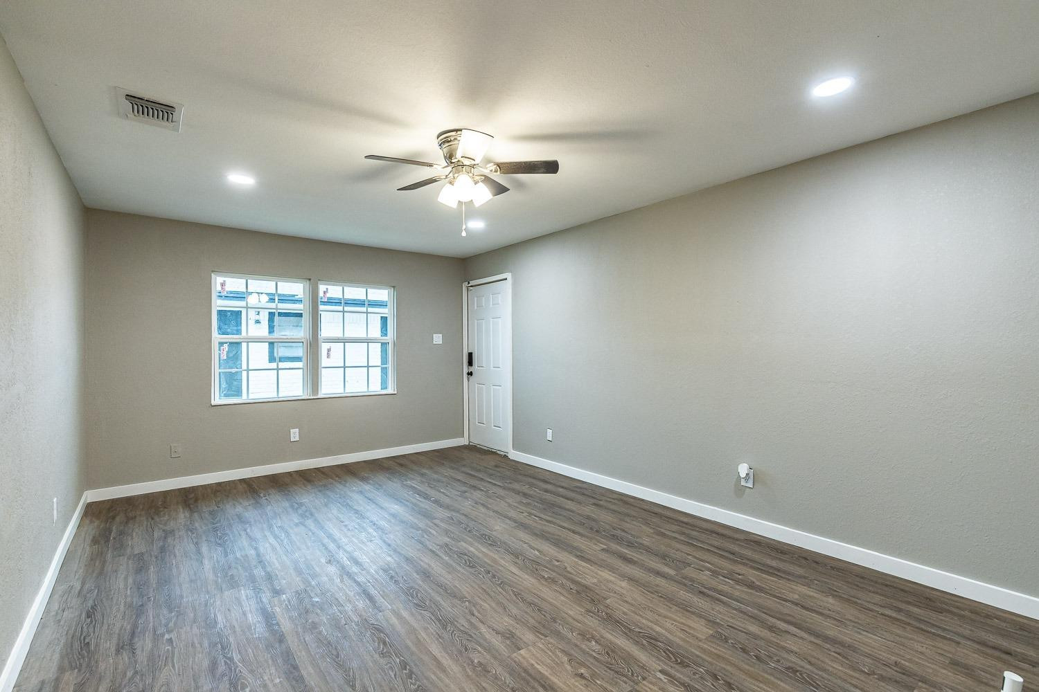 2104 22nd Street Lubbock, TX 79411 - Photo 5 of 33 Living Room - Unit A