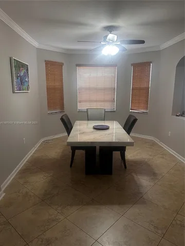 a view of a workspace with furniture