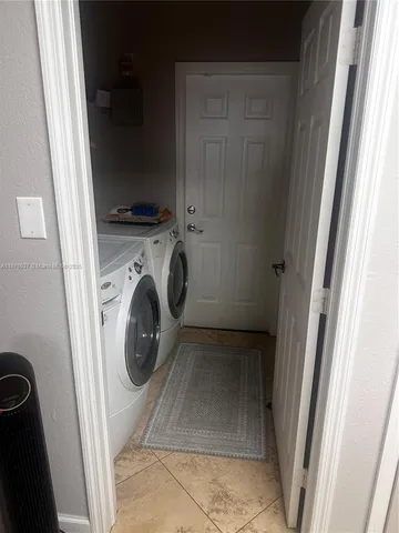 a view of utility room with washer and dryer