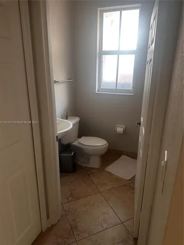 a bathroom with a toilet