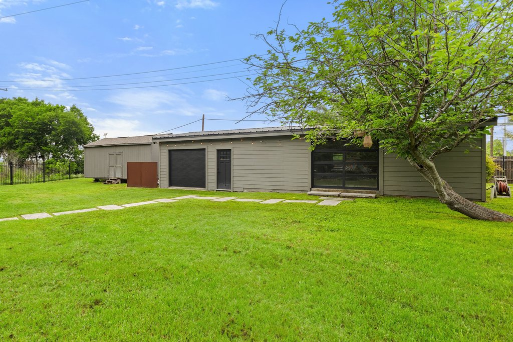 302 South Schramm Road Granger, TX 76530 - Photo 29 of 33 a view of a house with a yard