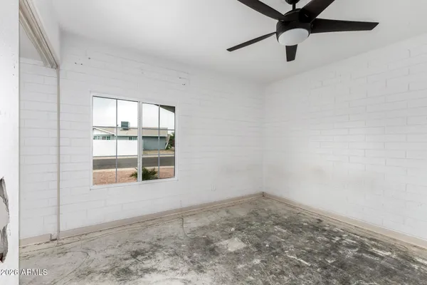 a bathroom with a sink vanity and toilet