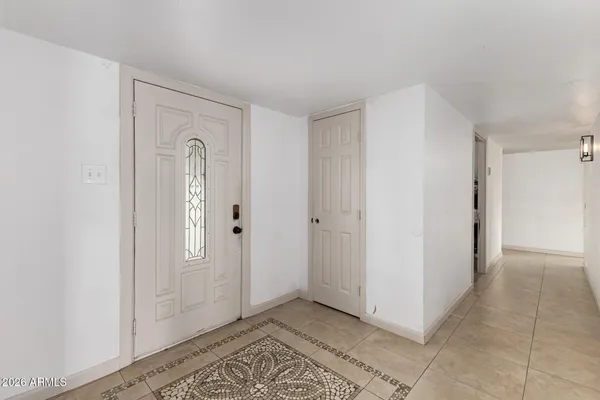 a kitchen with kitchen island a counter top space appliances and cabinets