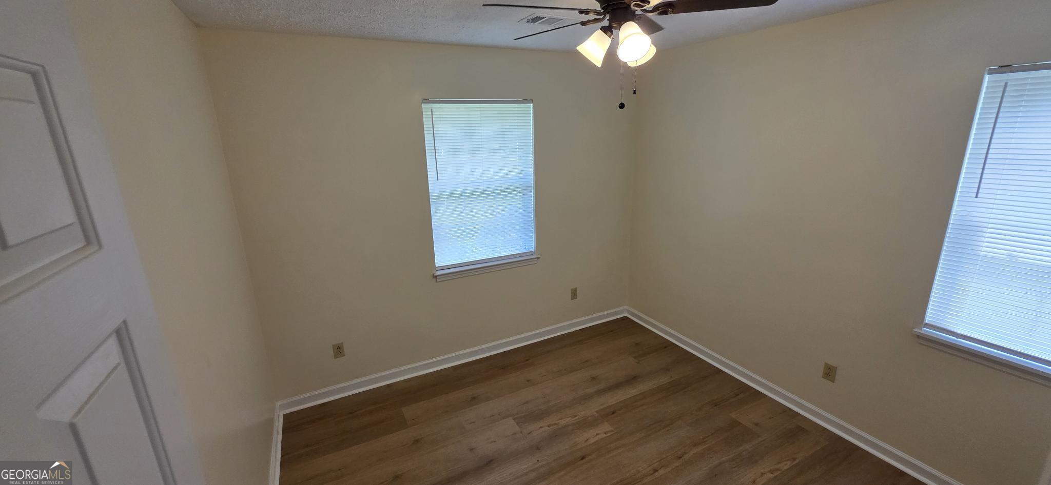 657 Tom McKinley Road Thomaston, GA 30286 - Photo 25 of 33 an empty room with a window