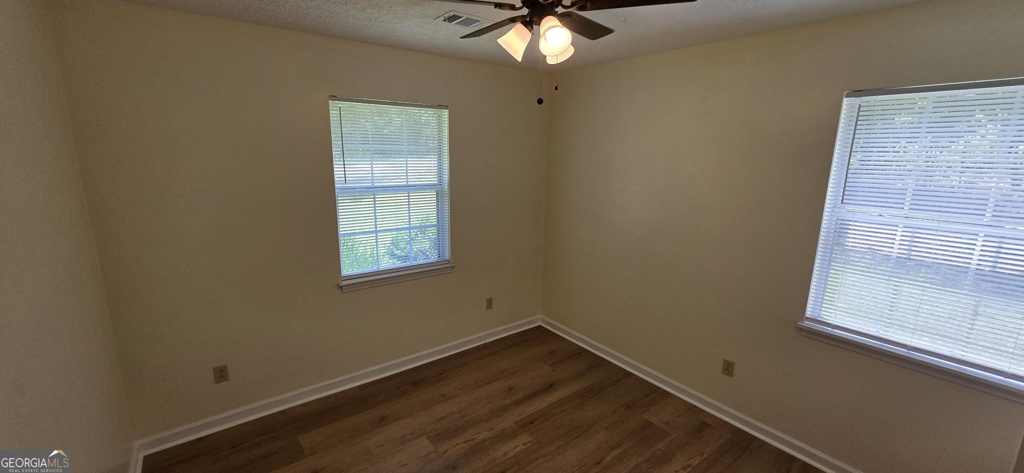 657 Tom McKinley Road Thomaston, GA 30286 - Photo 27 of 33 an empty room with a window