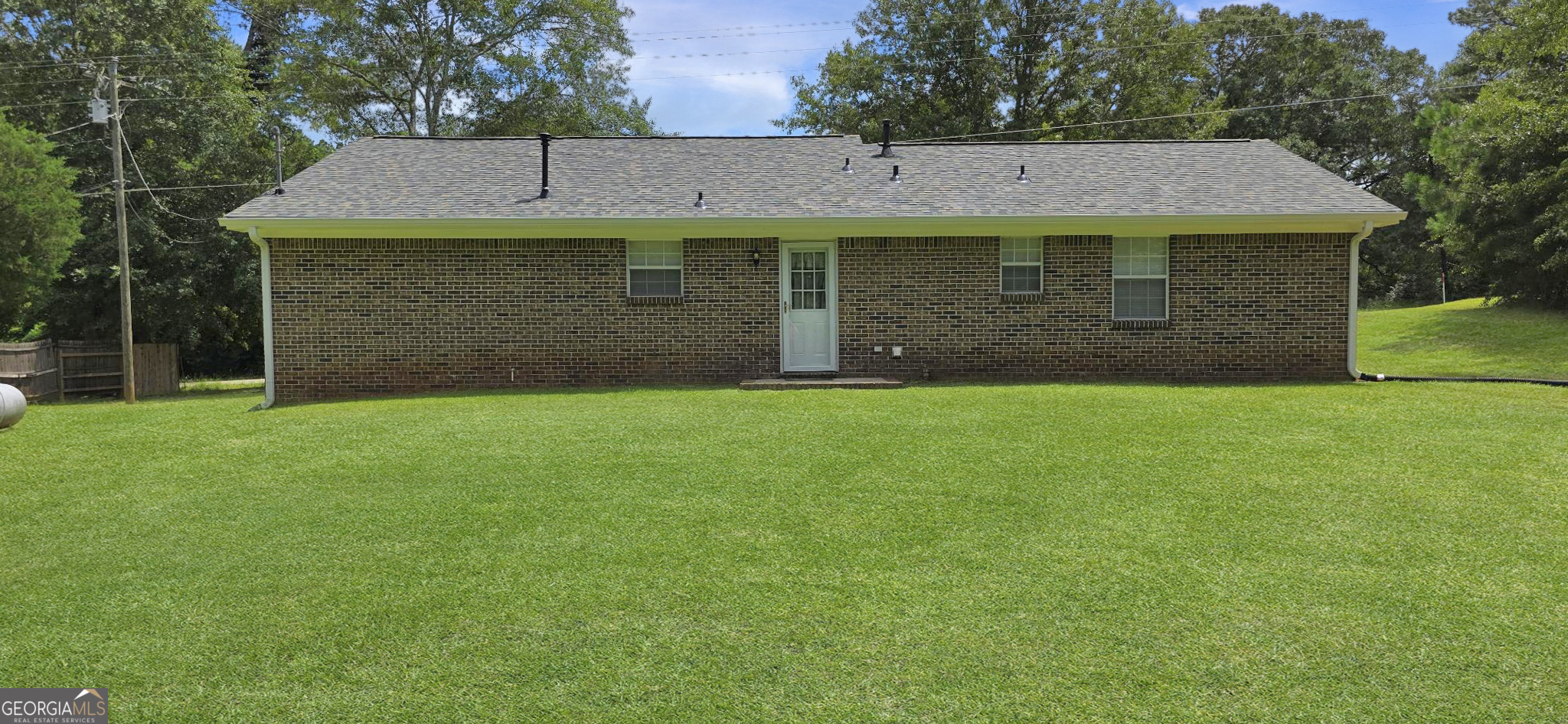 657 Tom McKinley Road Thomaston, GA 30286 - Photo 6 of 33 a front view of a house with a yard
