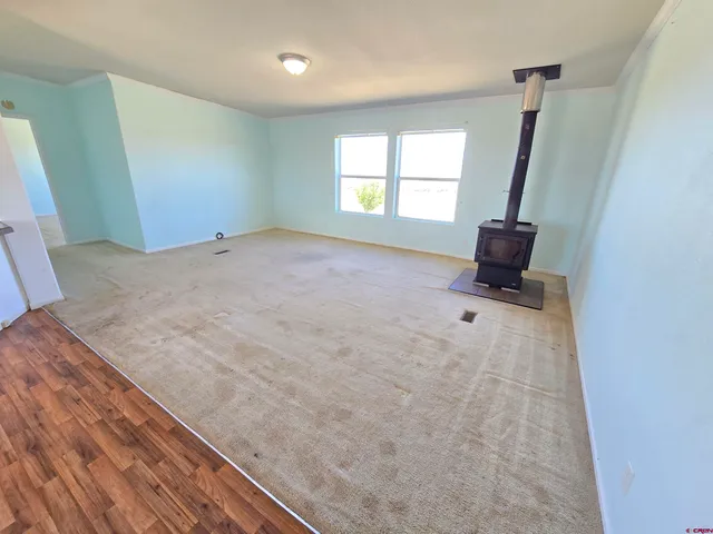 a workspace with furniture and window