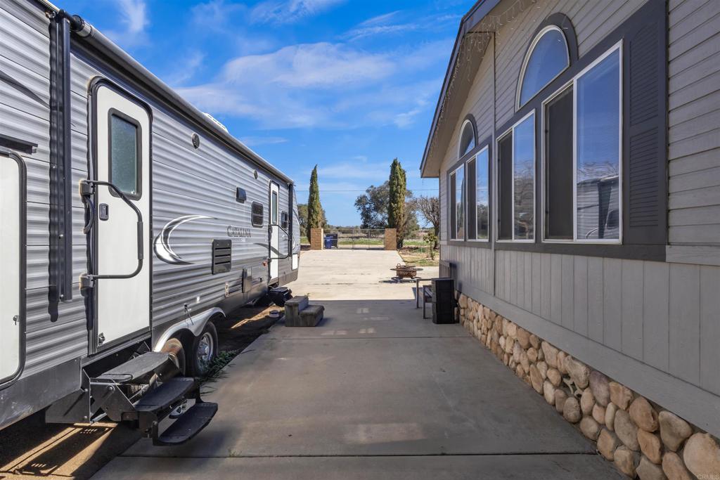 35683 Breezy Lane Ranchita, CA 92066 - Photo 15 of 73 a view of a porch with wooden floor and furniture
