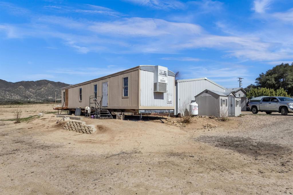 35683 Breezy Lane Ranchita, CA 92066 - Photo 20 of 73 a view of a house with a snow on the road