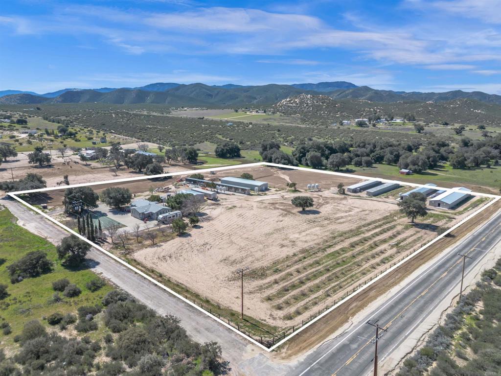 35683 Breezy Lane Ranchita, CA 92066 - Photo 2 of 73 a view of a terrace with a table and chairs under an umbrella